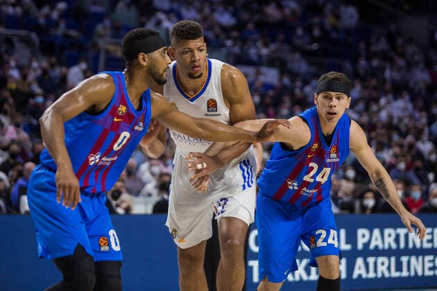 Spain: Real Madrid vs FC Barcelona, Barca Brandon Davies (L), Edy Tavares (C) and Kyle Kuric (R) during FC Barcelona victory over Real Madrid 68 - 86 in Turkish Airlines Euroleague regular season game (round 26) celebrated in Madrid (Spain) at Wizink Center. February 11th 2022. Madrid Madrid Spain Copyright: JuanxCarlosxGarcíaxMate