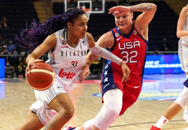 Belgium s Maxuella Lisowa Mbaka and USA s Kayla McBride fight for the ball during a basketball match between the Belgian Cats and the United States, a qualifier for the World Cup later this year, at Washington D.C. in the United States, Friday 11 February 2022. The Cats will be playing two World Cup qualifiers in Washington DC, US, and one in Santo Domingo, Dominican Republic. TONYxQUINN  x9099916x
