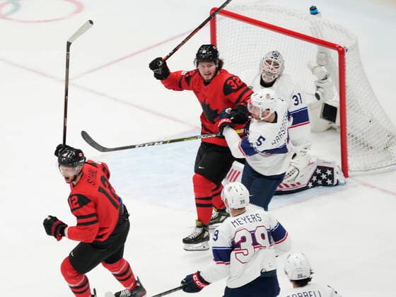 February 12, 2022, Beijing, ON, China: Team Canada forward Eric Staal (12) and forward Mason McTavish (32) celebrate a goal against Team United States goaltender Strauss Mann (31) as defender David Warsofsky (5) and forward Ben Meyers (39) look on during first period men s Ice hockey, Eishockey action at the 2022 Winter Olympics in Beijing on Saturday, Feb. 12, 2022. Canada News - February 12, 2022  - ZUMAc35_ 20220212_zaf_c35_028 Copyright: xRyanxRemiorzx
