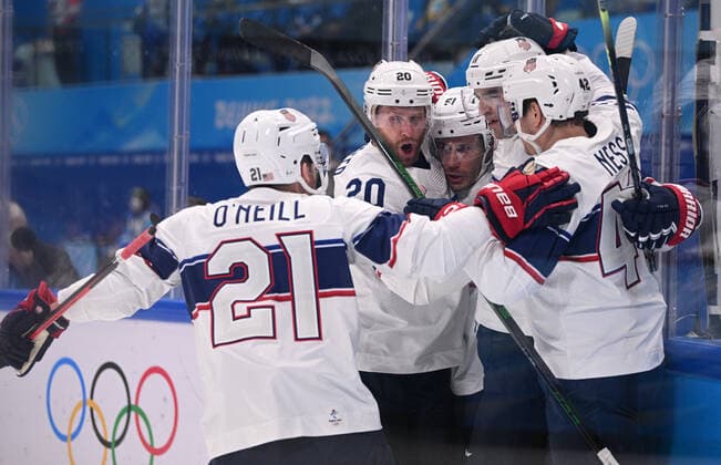 China Olympics 2022 Ice hockey, Eishockey Men Canada - US 8111956 12.02.2022 Players of the United States celebrate after scoring a goal in the men s ice hockey preliminary round group A match between Canada and the United States during the Beijing 2022 Winter Olympic Games, Olympische Spiele, Olympia, OS at National Indoor Stadium in Beijing, China. Alexey Filippov Sputnik Beijing China  Copyright: xAlexeyxFilippovx