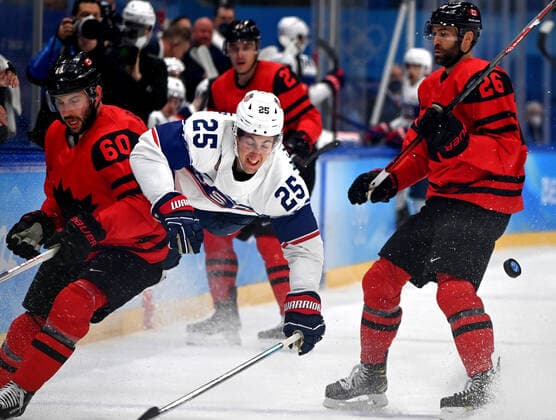 (220212) -- BEIJING, Feb. 12, 2022 -- Marc McLaughlin (C) of the United States vies with Jason Demers (L front) of Canada during the Ice hockey, Eishockey men s preliminary round Group A match between the United States and Canada at National Indoor Stadium in Beijing, capital of China, Feb. 12, 2022. ) (XHTP)(BEIJING2022)CHINA-BEIJING-OLYMPIC Winter games, Winterspiele,Spiele, Summer games ICE HOCKEY-MEN S PRELIMINARY ROUND-USA VS CAN (CN) LixZiheng 