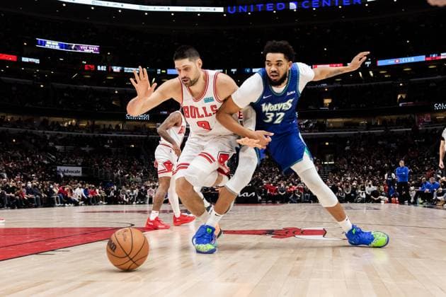 Karl-Anthony Towns 32, Minnesota Timberwolves and Nikola Vucevic 9, Chicago Bulls compete during the game on February 11, 2021 at the United Center Shaina Benhiyoun SPP National Basketball Association - Chicago Bulls vs Minnesota Timberwolves - United Center 