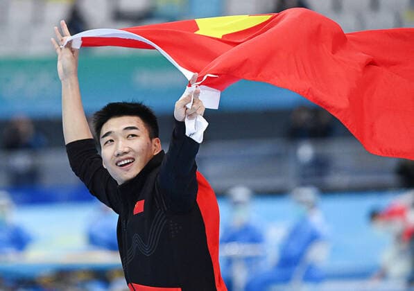 (220212) -- BEIJING, Feb. 12, 2022 -- Gao Tingyu of China celebrates after the Speed skating, Eisschnelllauf men s 500m event at the National Speed Skating Oval in Beijing, capital of China, Feb. 12, 2022. ) (BEIJING2022)CHINA-BEIJING-OLYMPIC Winter games, Winterspiele,Spiele, Summer games SPEED SKATING-MEN S 500M (CN) XiongxQi 