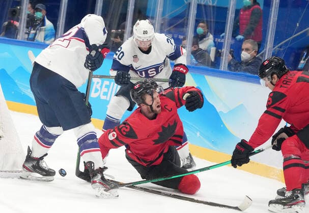 BEIJING, CHINA - FEBRUARY 12: Eric Staal 12 of Team Canada and Steven Kampfer 20 of Team United States compete during the second period of the Men s Ice hockey, Eishockey Preliminary Round Group A match between Team Canada and Team United States on Day 8 of the Beijing 2022 Winter Olympic Games, Olympische Spiele, Olympia, OS at National Indoor Stadium on February 12, 2022 in Beijing, China.  Copyright: xVCGx CFP111368904140 