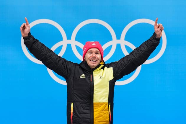 BEIJING, CHINA - FEBRUARY 11: Gold medallist Christopher Grotheer of Team Germany celebrates during the Men s Skeleton medal ceremony on day seven of Beijing 2022 Winter Olympic Games, Olympische Spiele, Olympia, OS at National Sliding Centre on February 11, 2022 in Beijing, China.  Copyright: xVCGx CFP111368813710 