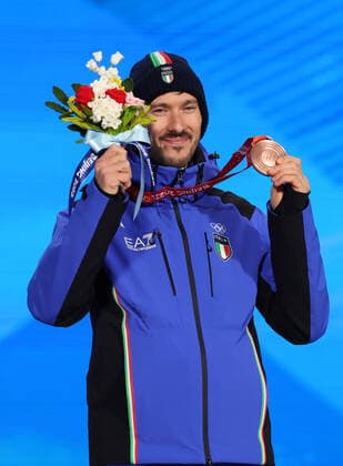 (220212) -- BEIJING, Feb. 12, 2022 -- Bronze medalist Davide Ghiotto of Italy poses during the awarding ceremony of Speed skating, Eisschnelllauf men s 10000m at the Beijing Medals Plaza of the Winter Olympics in Beijing, capital of China, Feb. 12, 2022. ) (BEIJING2022)CHINA-BEIJING-OLYMPIC Winter games, Winterspiele,Spiele, Summer games AWARDING CEREMONY (CN) ChengxTingting 