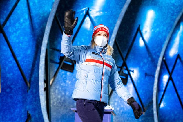(220212) -- ZHANGJIAKOU, Feb. 12, 2022 -- Gold medalist Marte Olsbu Roeiseland of Norway reacts during the awarding ceremony of biathlon women s 7.5km sprint at Zhangjiakou Medals Plaza of the Winter Olympics in Zhangjiakou, north China s Hebei Province, Feb. 12, 2022. ) (BEIJING2022)CHINA- ZHANGJIAKOU-OLYMPIC Winter games, Winterspiele,Spiele, Summer games AWARDING CEREMONY (CN) XiaoxYijiu 