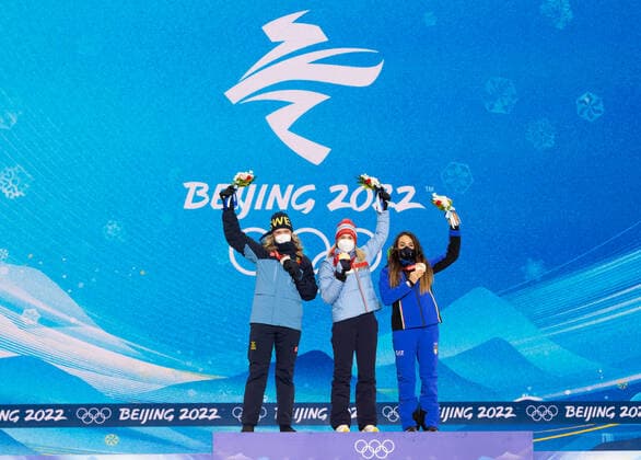 (220212) -- ZHANGJIAKOU, Feb. 12, 2022 -- Gold medalist Marte Olsbu Roeiseland (C) of Norway, silver medalist Elvira Oeberg (L) of Sweden and bronze medalist Dorothea Wierer of Italy pose during the awarding ceremony of biathlon women s 7.5km sprint at Zhangjiakou Medals Plaza of the Winter Olympics in Zhangjiakou, north China s Hebei Province, Feb. 12, 2022. ) (BEIJING2022)CHINA- ZHANGJIAKOU-OLYMPIC Winter games, Winterspiele,Spiele, Summer games AWARDING CEREMONY (CN) XiaoxYijiu 