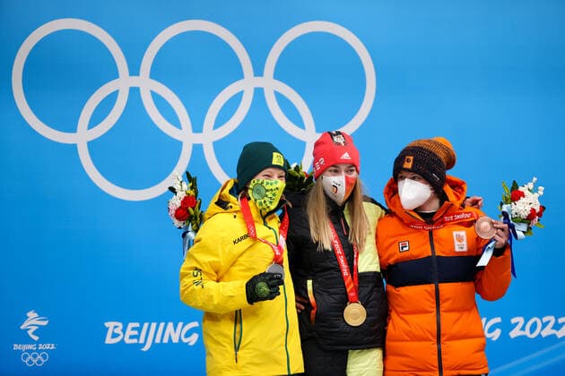 BEIJING, CHINA - FEBRUARY 12, 2022: Silver medalist, Jaclyn Narracott of Australia, Gold medalist, Hannah Neise of Germany and Bronze medalist, Kimberley Bos (L-R) of the Netherlands attend an award ceremony for the women s skeleton event at the 2022 Winter Olympic Games, Olympische Spiele, Olympia, OS at the Yanqing National Sliding Centre. Anton Novoderezhkin TASS  TS122C25