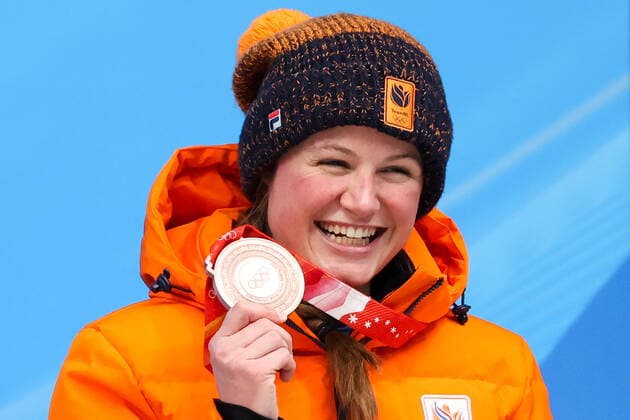 BEIJING, CHINA - FEBRUARY 12, 2022: Bronze medalist, Kimberley Bos of the Netherlands poses for a photograph during an award ceremony for the women s skeleton event at the 2022 Winter Olympic Games, Olympische Spiele, Olympia, OS at the Yanqing National Sliding Centre. Anton Novoderezhkin TASS  TS122C26