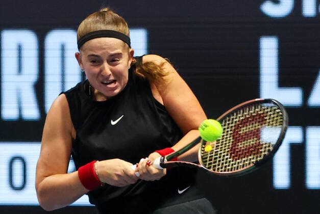 ST PETERSBURG, RUSSIA - FEBRUARY 12, 2022: Tennis player Jelena Ostapenko of Latvia returns the ball in a 2022 WTA, Tennis Damen St Petersburg Ladies Trophy semi-final singles match against Anett Kontaveit of Estonia, at the Sibur Arena. Alexander Demianchuk TASS  TS122C49