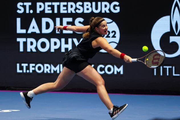 ST PETERSBURG, RUSSIA - FEBRUARY 12, 2022: Tennis player Jelena Ostapenko of Latvia returns the ball in a 2022 WTA, Tennis Damen St Petersburg Ladies Trophy semi-final singles match against Anett Kontaveit of Estonia, at the Sibur Arena. Alexander Demianchuk TASS  TS122C4B