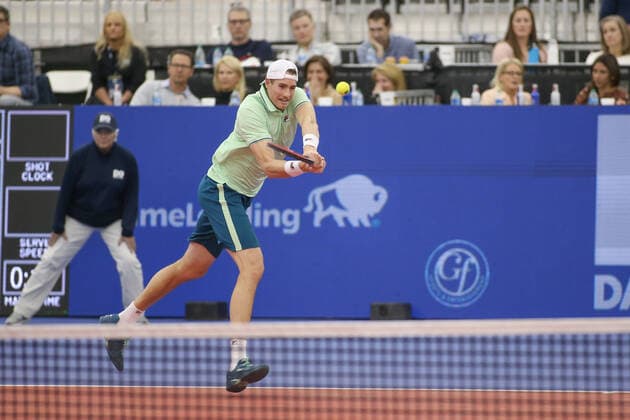 DALLAS, TX - FEBRUARY 12: John Isner (USA) hits a backhand during the Dallas Open on February 12, 2022 at the Styslinger Altec Tennis Complex in Dallas, TX. (Photo by George Walker Icon Sportswire) TENNIS: FEB 12 Dallas Open Icon22021232
