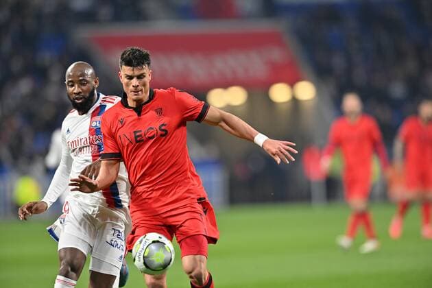 Moussa Dembele (lyon) vs Flavius Daniliuc (nice) FOOTBALL: Olympique Lyonnais vs OGC Nice - Ligue 1 - 12 02 2022 FredericChambert Panoramic 