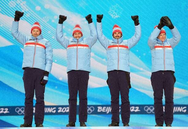 China Olympics 2022 Medal Ceremony 8113441 13.02.2022 Silver medalists Norway s Emil Iversen, Paal Golberg, Hans Christer Holund and Johannes Hoesflot Klaebo celebrate during an award ceremony for the men s cross-country 4x10 km relay event during the Beijing 2022 Winter Olympic Games, Olympische Spiele, Olympia, OS at the Medals Plaza in Zhangjiakou, China. Pavel Bednyakov Sputnik Zhangjiakou China  Copyright: xPavelxBednyakovx