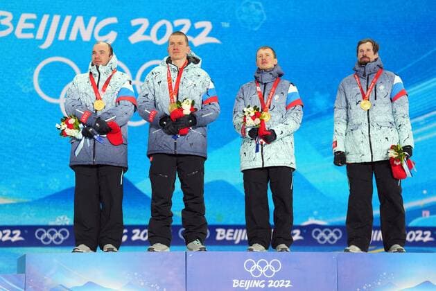 China Olympics 2022 Medal Ceremony 8113446 13.02.2022 From left, gold medalists Russian Olympic Committee s Alexey Chervotkin, Alexander Bolshunov, Denis Spitsov and Sergey Ustiugov celebrate their victory during an award ceremony for the men s cross-country 4x10 km relay event during the Beijing 2022 Winter Olympic Games, Olympische Spiele, Olympia, OS at the Medals Plaza in Zhangjiakou, China. Pavel Bednyakov Sputnik Zhangjiakou China  Copyright: xPavelxBednyakovx