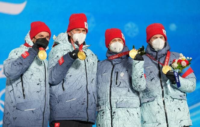 China Olympics 2022 Medal Ceremony 8113454 13.02.2022 From left, gold medalists Russian Olympic Committee s Alexey Chervotkin, Alexander Bolshunov, Denis Spitsov and Sergey Ustiugov celebrate their victory during an award ceremony for the men s cross-country 4x10 km relay event during the Beijing 2022 Winter Olympic Games, Olympische Spiele, Olympia, OS at the Medals Plaza in Zhangjiakou, China. Pavel Bednyakov Sputnik Zhangjiakou China  Copyright: xPavelxBednyakovx