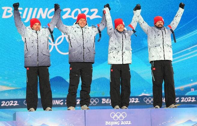 China Olympics 2022 Medal Ceremony 8113543 13.02.2022 From left, gold medalists Russian Olympic Committee s Alexey Chervotkin, Alexander Bolshunov, Denis Spitsov and Sergey Ustiugov celebrate their victory during an award ceremony for the men s cross-country 4x10 km relay event during the Beijing 2022 Winter Olympic Games, Olympische Spiele, Olympia, OS at the Medals Plaza in Zhangjiakou, China. Pavel Bednyakov Sputnik Zhangjiakou China  Copyright: xPavelxBednyakovx