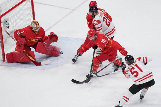 (220213) -- BEIJING, Feb. 13, 2022 -- David Desharnais (1st R) of Canada tries to shoot during the Ice hockey, Eishockey men s preliminary round Group A match between China and Canada at National Indoor Stadium in Beijing, capital of China, Feb. 13, 2022. ) (BEIJING2022)CHINA-BEIJING-OLYMPIC Winter games, Winterspiele,Spiele, Summer games ICE HOCKEY-MEN S PRELIMINARY-CHN VS CAN(CN) DuxYu 