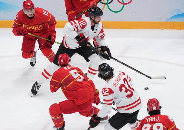 (220213) -- BEIJING, Feb. 13, 2022 -- Eric Staal (2nd L) of Canada controls the puck during the Ice hockey, Eishockey men s preliminary round Group A match between China and Canada at National Indoor Stadium in Beijing, capital of China, Feb. 13, 2022. ) (BEIJING2022)CHINA-BEIJING-OLYMPIC Winter games, Winterspiele,Spiele, Summer games ICE HOCKEY-MEN S PRELIMINARY-CHN VS CAN(CN) DuxYu 