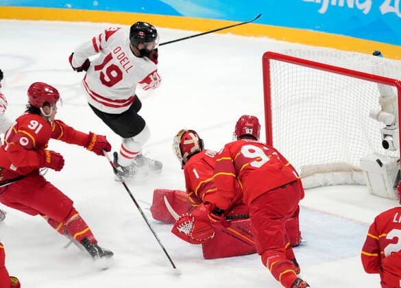February 13, 2022, Beijing, ON, China: Canada forward Eric O Dell (19) scores on China goaltender Yongli Ouban (1) during first period men s Ice hockey, Eishockey action at the Beijing Olympic Winter games, Winterspiele,Spiele, Summer games in Beijing, Sunday, Feb. 13, 2022. Canada v. China Men s Olympic Ice Hockey - ZUMAc35_ 20220213_zaf_c35_029 Copyright: xRyanxRemiorzx