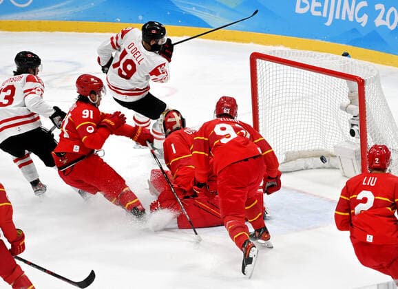 (220213) -- BEIJING, Feb. 13, 2022 -- Eric O Dell of Canada (top) shoots during the Ice hockey, Eishockey men s preliminary round Group A match between China and Canada at National Indoor Stadium in Beijing, capital of China, Feb. 13, 2022. ) (BEIJING2022)CHINA-BEIJING-OLYMPIC Winter games, Winterspiele,Spiele, Summer games ICE HOCKEY-MEN S PRELIMINARY-CHN VS CAN(CN) LixZiheng 
