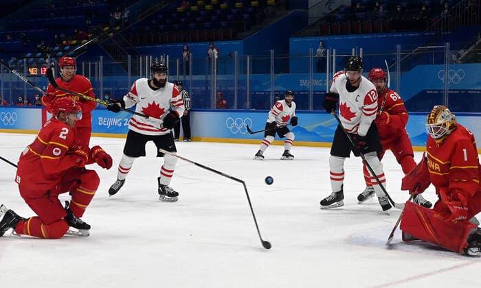 (220213) -- BEIJING, Feb. 13, 2022 -- Liu Jie (front) of China reacts during the Ice hockey, Eishockey men s preliminary round Group A match between China and Canada at National Indoor Stadium in Beijing, capital of China, Feb. 13, 2022. ) (BEIJING2022)CHINA-BEIJING-OLYMPIC Winter games, Winterspiele,Spiele, Summer games ICE HOCKEY-MEN S PRELIMINARY-CHN VS CAN(CN) LiuxXiao 