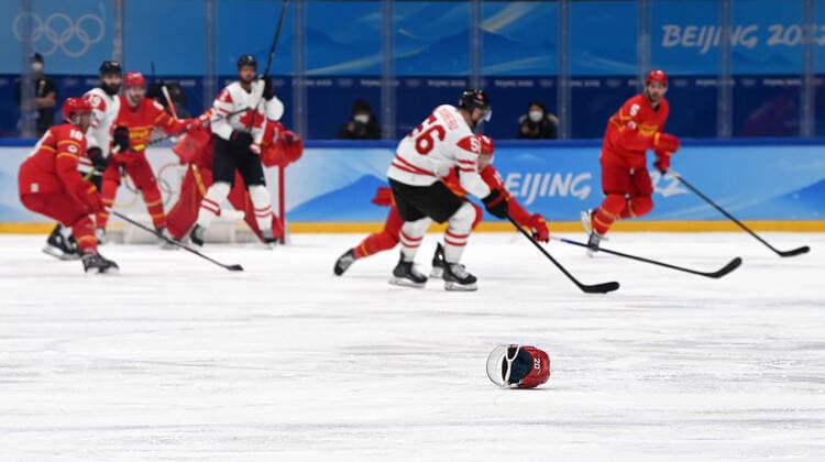 (220213) -- BEIJING, Feb. 13, 2022 -- The helmet of China s Luo Jia is seen during the Ice hockey, Eishockey men s preliminary round Group A match between China and Canada at National Indoor Stadium in Beijing, capital of China, Feb. 13, 2022. ) (BEIJING2022)CHINA-BEIJING-OLYMPIC Winter games, Winterspiele,Spiele, Summer games ICE HOCKEY-MEN S PRELIMINARY-CHN VS CAN(CN) LiuxXiao 