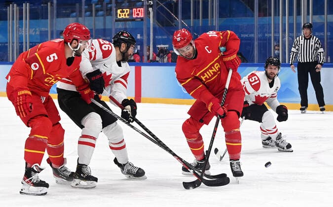 (220213) -- BEIJING, Feb. 13, 2022 -- Ye Jinguang (3rd L) of China competes during the Ice hockey, Eishockey men s preliminary round Group A match between China and Canada at National Indoor Stadium in Beijing, capital of China, Feb. 13, 2022. ) (BEIJING2022)CHINA-BEIJING-OLYMPIC Winter games, Winterspiele,Spiele, Summer games ICE HOCKEY-MEN S PRELIMINARY-CHN VS CAN(CN) LiuxXiao 