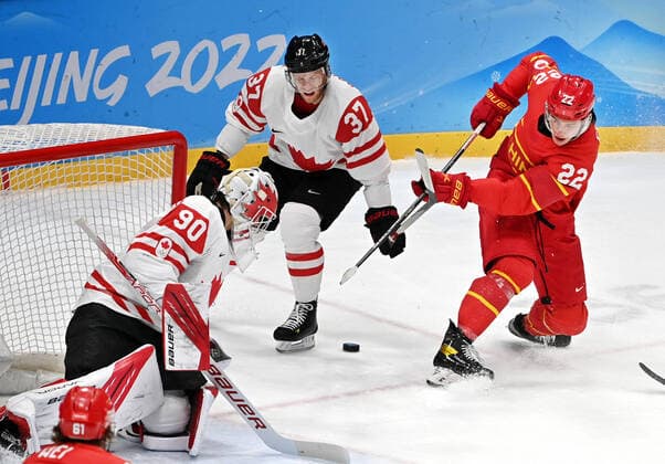 (220214) -- BEIJING, Feb. 13, 2022 -- Fu Shuai (R) of China competes during the Ice hockey, Eishockey men s preliminary round Group A match between China and Canada at National Indoor Stadium in Beijing, capital of China, Feb. 13, 2022. ) (BEIJING2022)CHINA-BEIJING-OLYMPIC Winter games, Winterspiele,Spiele, Summer games ICE HOCKEY-MEN S PRELIMINARY-CHN VS CAN(CN) LixZiheng 