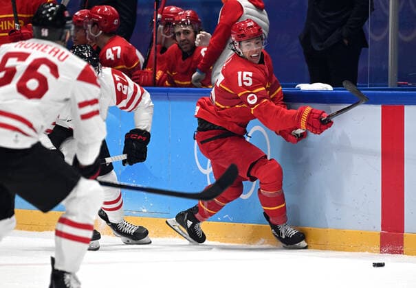 (220214) -- BEIJING, Feb. 13, 2022 -- Ru Jiang (R) of China competes during the Ice hockey, Eishockey men s preliminary round Group A match between China and Canada at National Indoor Stadium in Beijing, capital of China, Feb. 13, 2022. ) (BEIJING2022)CHINA-BEIJING-OLYMPIC Winter games, Winterspiele,Spiele, Summer games ICE HOCKEY-MEN S PRELIMINARY-CHN VS CAN(CN) LixAn 