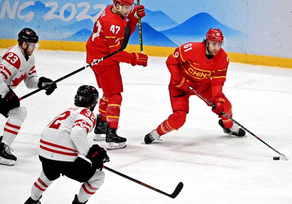 (220214) -- BEIJING, Feb. 13, 2022 -- Wei Ruike (R) of China competes during the Ice hockey, Eishockey men s preliminary round Group A match between China and Canada at National Indoor Stadium in Beijing, capital of China, Feb. 13, 2022. ) (BEIJING2022)CHINA-BEIJING-OLYMPIC Winter games, Winterspiele,Spiele, Summer games ICE HOCKEY-MEN S PRELIMINARY-CHN VS CAN(CN) LixZiheng 