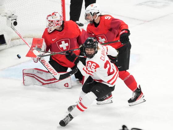 February 14, 2022, Beijing, ON, China: Canada forward Emily Clark (26) reacts after teammate Claire Thompson, not shown, scores against Switzerland goaltender Andrea Braendli during first period women s Ice hockey, Eishockey semifinals action Monday, February 14, 2022 at the 2022 Winter Olympics in Beijing. Canada News - February 14, 2022 - ZUMAc35_ 20220214_zaf_c35_013 Copyright: xRyanxRemiorzx