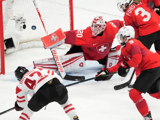 February 14, 2022, Beijing, ON, China: Canada forward Jamie Lee Rattray (47) scores on Switzerland goaltender Andrea Braendli during first period women s Ice hockey, Eishockey semifinals action Monday, February 14, 2022 at the 2022 Winter Olympics in Beijing. Canada News - February 14, 2022  - ZUMAc35_ 20220214_zaf_c35_015 Copyright: xRyanxRemiorzx