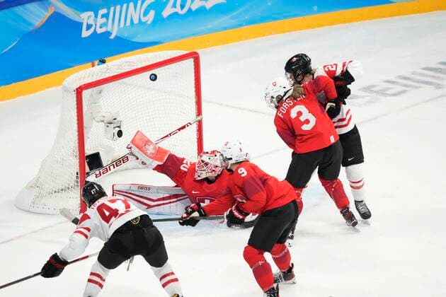 February 14, 2022, Beijing, ON, China: Canada forward Jamie Lee Rattray (47) scores on Switzerland goaltender Andrea Braendli during first period women s Ice hockey, Eishockey semifinals action Monday, February 14, 2022 at the 2022 Winter Olympics in Beijing. Canada News - February 14, 2022  - ZUMAc35_ 20220214_zaf_c35_014 Copyright: xRyanxRemiorzx