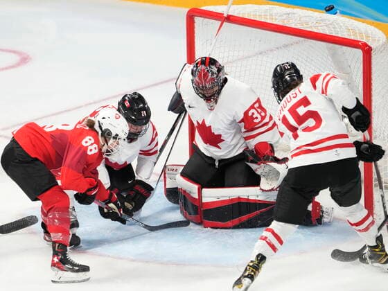 February 14, 2022, Beijing, ON, China: Canada goaltender Ann-Renee Desbiens makes a save as Switzerland forward Phoebe Staenz (88) looks for a rebound during first period women s Ice hockey, Eishockey semifinals action Monday, February 14, 2022 at the 2022 Winter Olympics in Beijing. Canada News - February 14, 2022  - ZUMAc35_ 20220214_zaf_c35_018 Copyright: xRyanxRemiorzx