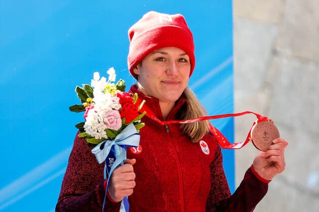BEIJING, CHINA â€“ FEBRUARY 14, 2022: Bobsledder Christine de Bruin of Canada poses with her bronze medal at a victory ceremony for the women s monobob event during the Beijing 2022 Winter Olympic Games, Olympische Spiele, Olympia, OS at the Yanqing National Sliding Centre. Anton Novoderezhkin TASS  TS12303E