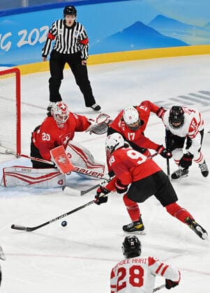 (220214) -- BEIJING, Feb. 14, 2022 -- Keely Moy (3rd R) of Switzerland competes during the Ice hockey, Eishockey women s play-off semifinal between Canada and Switzerland at Wukesong Sports Centre in Beijing, capital of China, Feb. 14, 2022. ) (BEIJING2022)CHINA-BEIJING-OLYMPIC Winter games, Winterspiele,Spiele, Summer games ICE HOCKEY-WOMEN S PLAYOFF SEMIFINAL-CANADA VS SWITZERLAND (CN) LixRan 