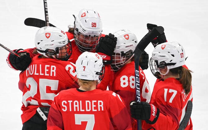 (220214) -- BEIJING, Feb. 14, 2022 -- Athletes of Switzerland celebrate scoring during the Ice hockey, Eishockey women s play-off semifinal between Canada and Switzerland at Wukesong Sports Centre in Beijing, capital of China, Feb. 14, 2022. ) (BEIJING2022)CHINA-BEIJING-OLYMPIC Winter games, Winterspiele,Spiele, Summer games ICE HOCKEY-WOMEN S PLAYOFF SEMIFINAL-CANADA VS SWITZERLAND (CN) LiuxXiao 