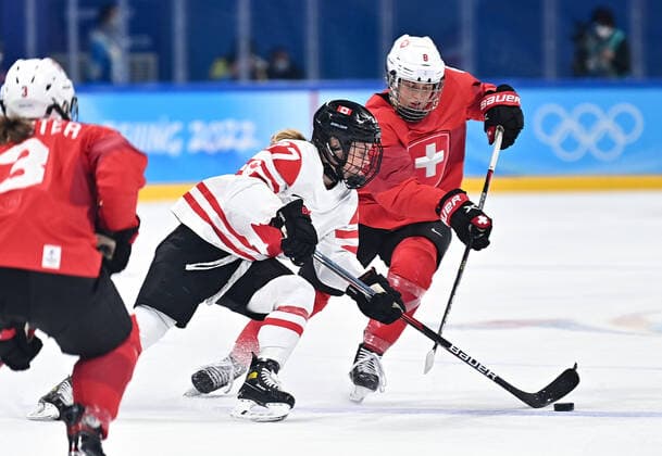 (220214) -- BEIJING, Feb. 14, 2022 -- Emma Maltais (C) of Canada vies with Kaleigh Hofstetter of Switzerland during the Ice hockey, Eishockey women s semifinal of Beijing 2022 Winter Olympics at Wukesong Sports Centre in Beijing, capital of China, Feb. 14, 2022. ) (BEIJING2022)CHINA-BEIJING-OLYMPIC Winter games, Winterspiele,Spiele, Summer games ICE HOCKEY-SEMIFINAL-CAN VS SUI (CN) SongxYanhua 