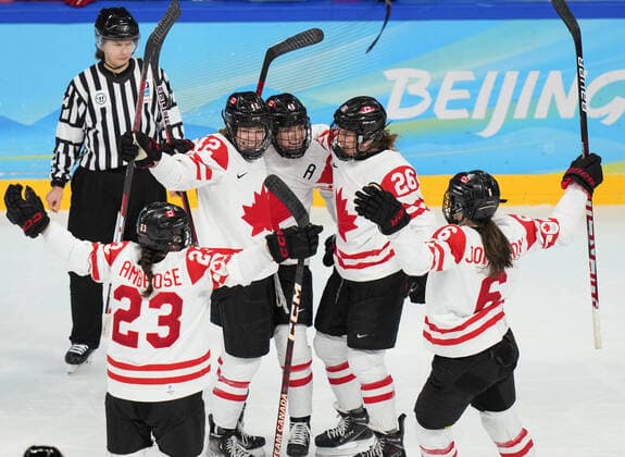 (220214) -- BEIJING, Feb. 14, 2022 -- Athletes of Canada celebrate scoring during the Ice hockey, Eishockey women s play-off semifinal between Canada and Switzerland at Wukesong Sports Centre in Beijing, capital of China, Feb. 14, 2022. ) (BEIJING2022)CHINA-BEIJING-OLYMPIC Winter games, Winterspiele,Spiele, Summer games ICE HOCKEY-WOMEN S PLAYOFF SEMIFINAL-CANADA VS SWITZERLAND (CN) MengxYongmin 