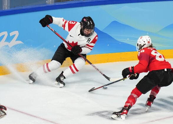 (220214) -- BEIJING, Feb. 14, 2022 -- Jocelyne Larocque (L) of Canada vies with Phoebe Staenz of Switzerland during the Ice hockey, Eishockey women s play-off semifinal between Canada and Switzerland at Wukesong Sports Centre in Beijing, capital of China, Feb. 14, 2022. ) (BEIJING2022)CHINA-BEIJING-OLYMPIC Winter games, Winterspiele,Spiele, Summer games ICE HOCKEY-WOMEN S PLAYOFF SEMIFINAL-CANADA VS SWITZERLAND (CN) MengxYongmin 