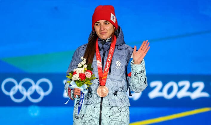 BEIJING, CHINA - FEBRUARY 14, 2022: Bronze medalist, ROC athlete Angelina Golikova attends an award ceremony for the women s 500m Speed skating, Eisschnelllauf event at the 2022 Winter Olympic Games, Olympische Spiele, Olympia, OS at the Medals Plaza. Anton Novoderezhkin TASS  TS123134