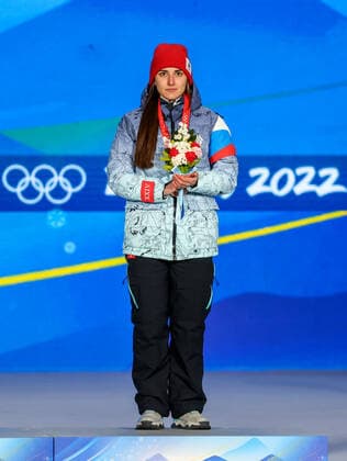 BEIJING, CHINA - FEBRUARY 14, 2022: Bronze medalist, ROC athlete Angelina Golikova attends an award ceremony for the women s 500m Speed skating, Eisschnelllauf event at the 2022 Winter Olympic Games, Olympische Spiele, Olympia, OS at the Medals Plaza. Anton Novoderezhkin TASS  TS123135