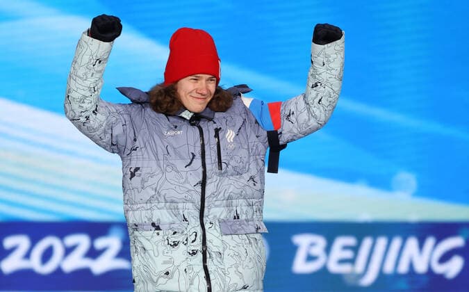 BEIJING, CHINA - FEBRUARY 14, 2022: Silver medalist, ROC athlete Konstantin Ivliyev attends an award ceremony for the men s 500m short track Speed skating, Eisschnelllauf event at the 2022 Winter Olympic Games, Olympische Spiele, Olympia, OS at the Medal Plaza. Anton Novoderezhkin TASS  TS12316D