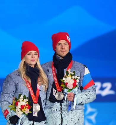 China Olympics 2022 Medal Ceremony 8114560 14.02.2022 Silver medalists Russian Olympic Committee s Victoria Sinitsina and Nikita Katsalapov celebrate on the podium during the medal ceremony for the ice dance Figure skating, Eiskunstlauf event during the Beijing 2022 Winter Olympic Games, Olympische Spiele, Olympia, OS at the Medals Plaza in Beijing, China. Alexander Vilf Sputnik Beijing China  Copyright: xAlexanderxVilfx