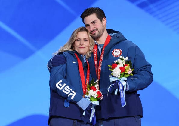 (220214) -- BEIJING, Feb. 14, 2022 -- Bronze medalists Madison Hubbell Zachary Donohue of the United States react during the awarding ceremony of Figure skating, Eiskunstlauf ice dance free dance at the Beijing Medals Plaza of the Winter Olympics in Beijing, capital of China, Feb. 14, 2022. ) (BEIJING2022)CHINA-BEIJING-OLYMPIC Winter games, Winterspiele,Spiele, Summer games AWARDING CEREMONY (CN) CaoxCan 