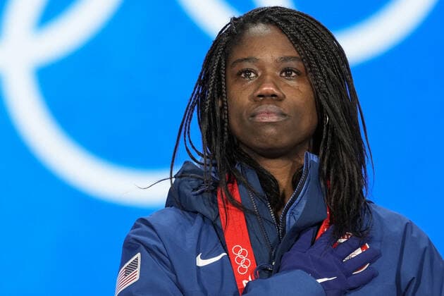 Erin Jackson of the U.S. cries as she listens to her national anthem during the medals ceremony for the Women s Speed skating, Eisschnelllauf 500 meter race at the Beijing 2022 Winter Olympics on Monday, February 14, 2022. Jackson won the gold medal.  OLY20220214301 PaulxHanna