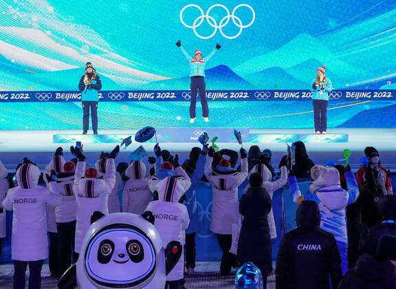 (220214) -- ZHANGJIAKOU, Feb. 14, 2022 -- Gold medalist Marte Olsbu Roeiseland (C) of Norway, silver medalist Elvira Oeberg (L) of Sweden and bronze medalist Tiril Eckhoff of Norway pose during the awarding ceremony of biathlon women s 10km pursuit at Zhangjiakou Medals Plaza of the Winter Olympics in Zhangjiakou, north China s Hebei Province, Feb. 14, 2022. ) (BEIJING2022)CHINA- ZHANGJIAKOU-OLYMPIC Winter games, Winterspiele,Spiele, Summer games AWARDING CEREMONY (CN) DingxTing 