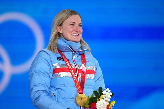(220214) -- ZHANGJIAKOU, Feb. 14, 2022 -- Gold medalist Marte Olsbu Roeiseland of Norway reacts during the awarding ceremony of biathlon women s 10km pursuit at Zhangjiakou Medals Plaza of the Winter Olympics in Zhangjiakou, north China s Hebei Province, Feb. 14, 2022. ) (BEIJING2022)CHINA- ZHANGJIAKOU-OLYMPIC Winter games, Winterspiele,Spiele, Summer games AWARDING CEREMONY (CN) ZhanxYan 
